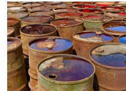 Rusty oil drums (health and environment).